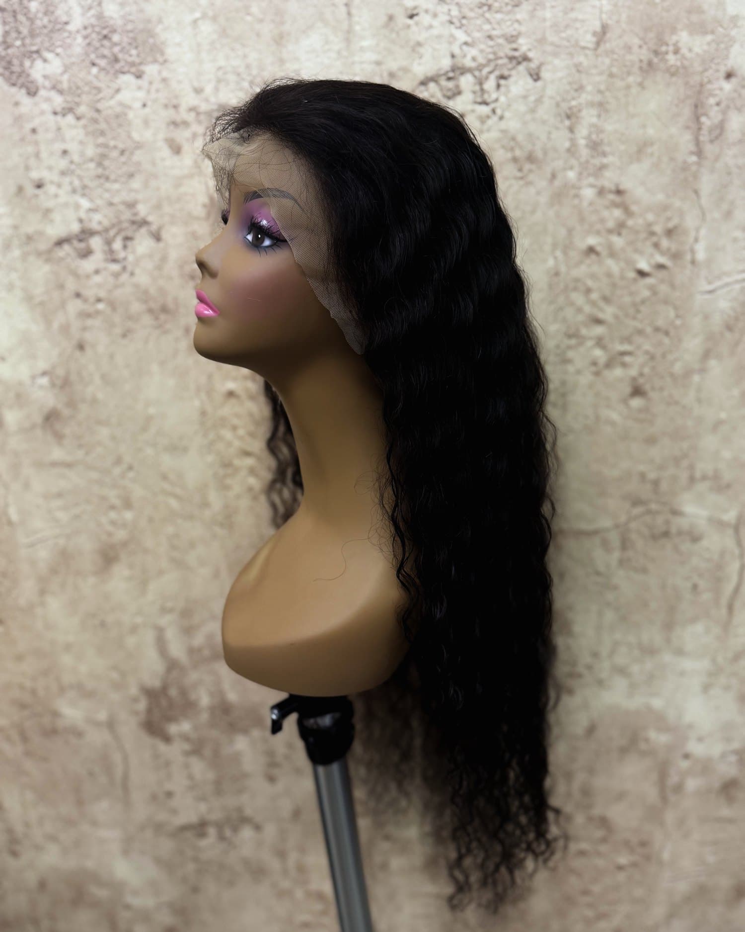 Black deep-wave lace unit on a stand, seen from the side.